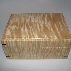 Small Tiger Maple Box Upholstered In Dark Brown..
